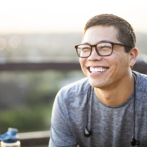 general dentistry featured image young man smiling